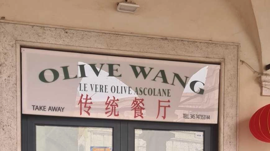 Wang: le vere olive ascolane. Il negozio fa infuriare tutti. Ma è un set cinematografico